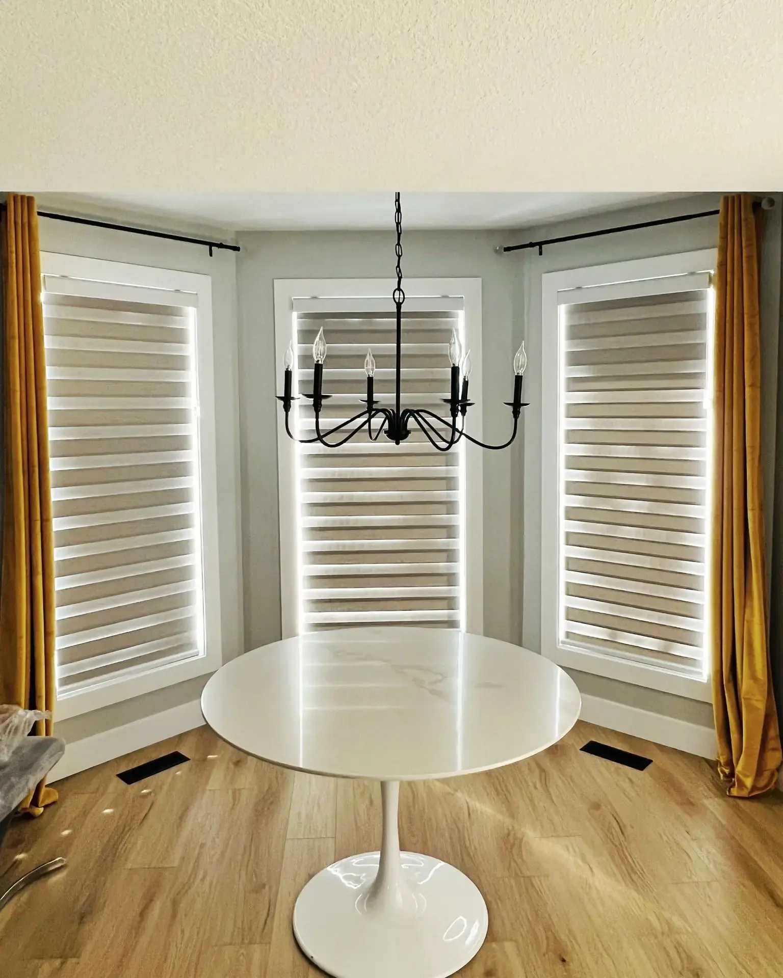 Grey zebra blinds in a contemporary bedroom setting